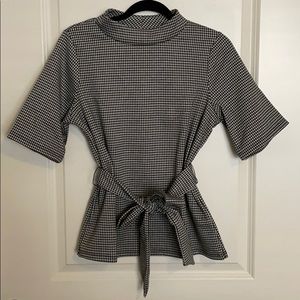 Houndstooth mock neck blouse